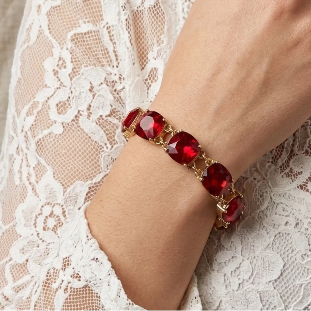 Cosmopolitan Gold Tone Red Crystal Bracelet | Cushion Cut Toggle Clasp